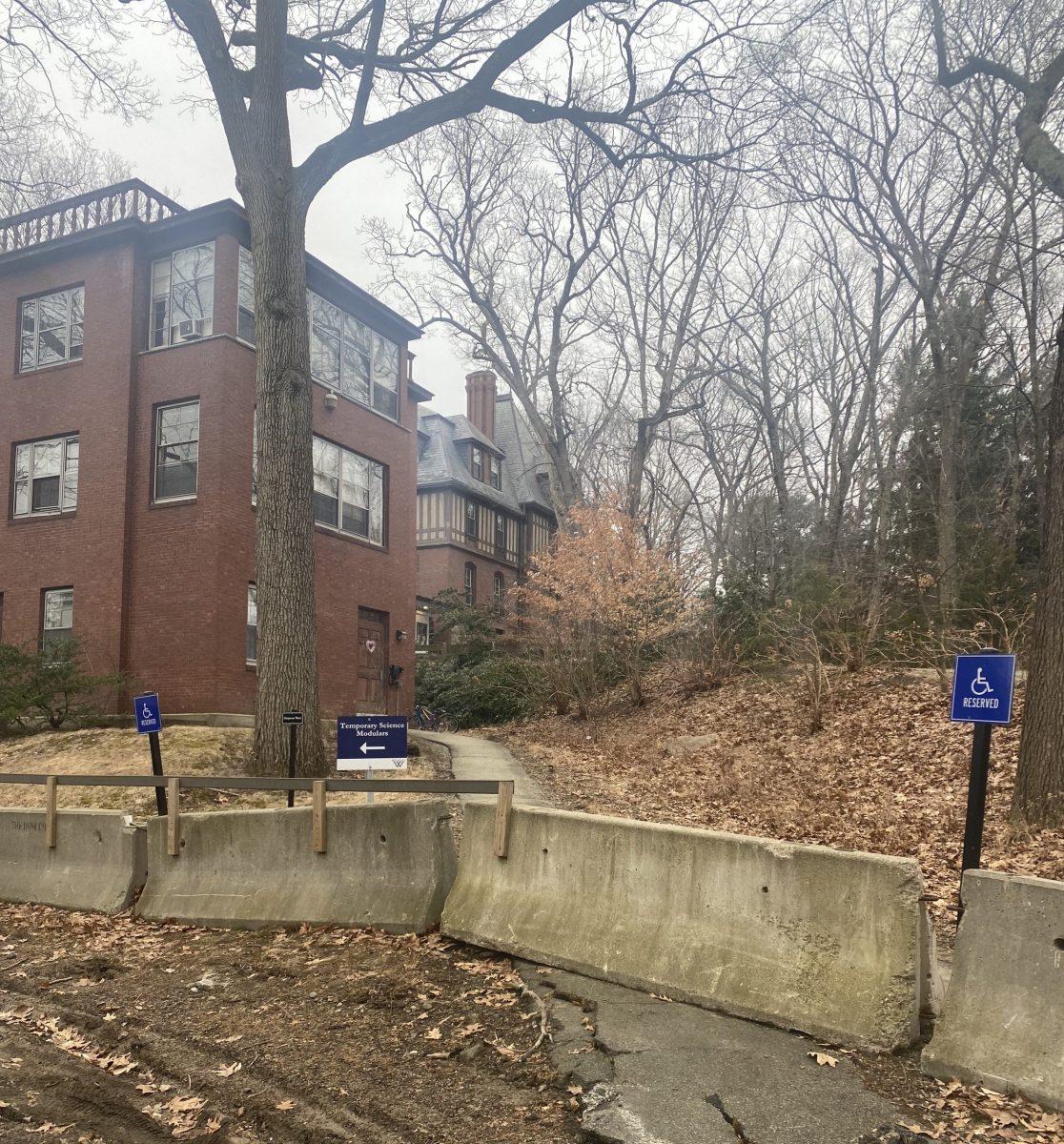 The Simpson West residential hall is located on the bottom floor of the building to the left of Health Services. The path to enter shown here is blocked off; there is another path to the right.